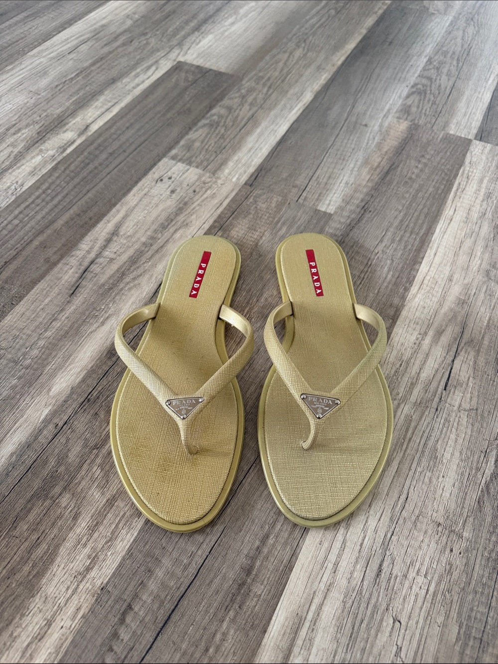 Prada Metallic Gold Triangle Logo Flip Flop Sandals